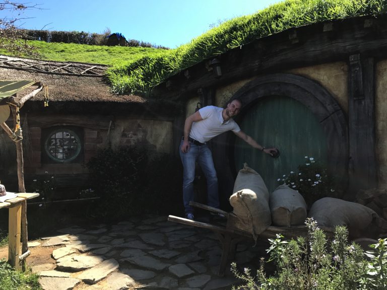 Me in front of a Hobbit House