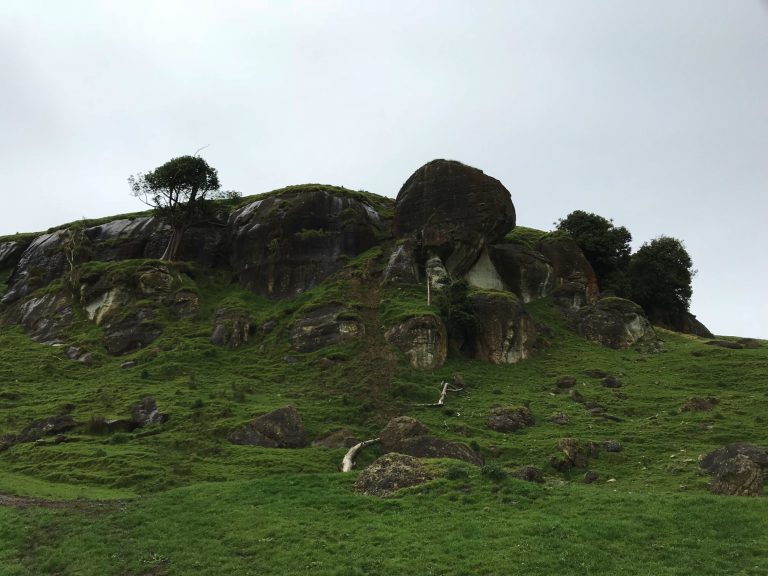 Big rocks in the middle of green fields