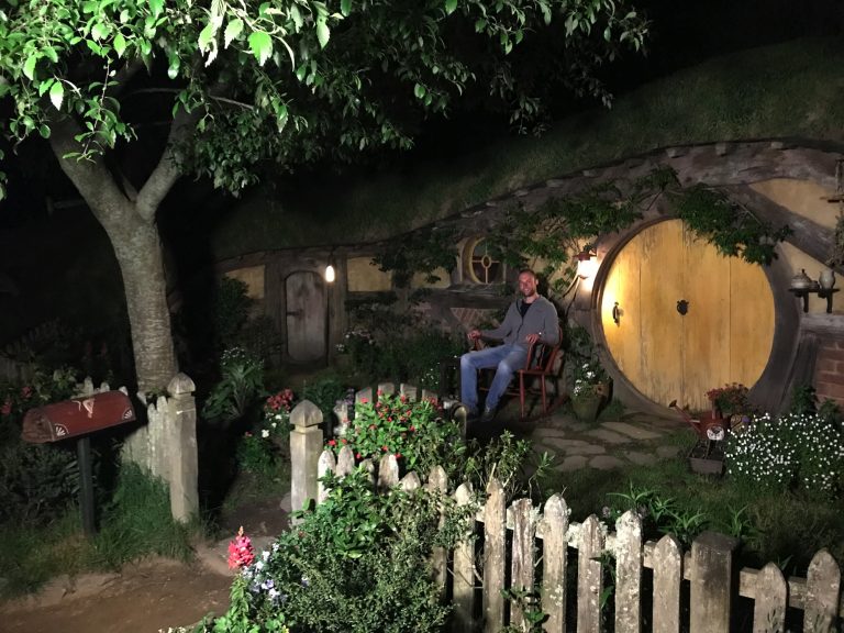 Me in front of a Hobbit house at night 2