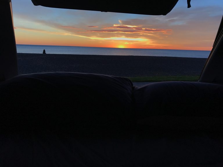 Watching the sunrise from my bed in the camper